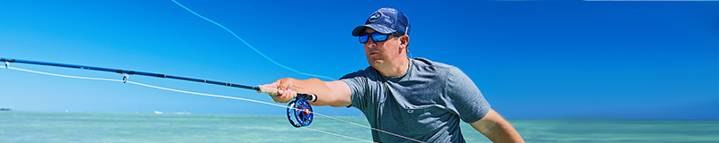 Capt. Jesse casting his fishing rod