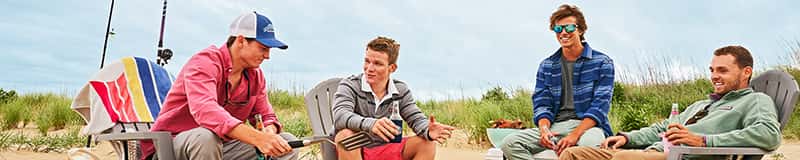 evan langford, daniel vail and some friends hanging out on the beach