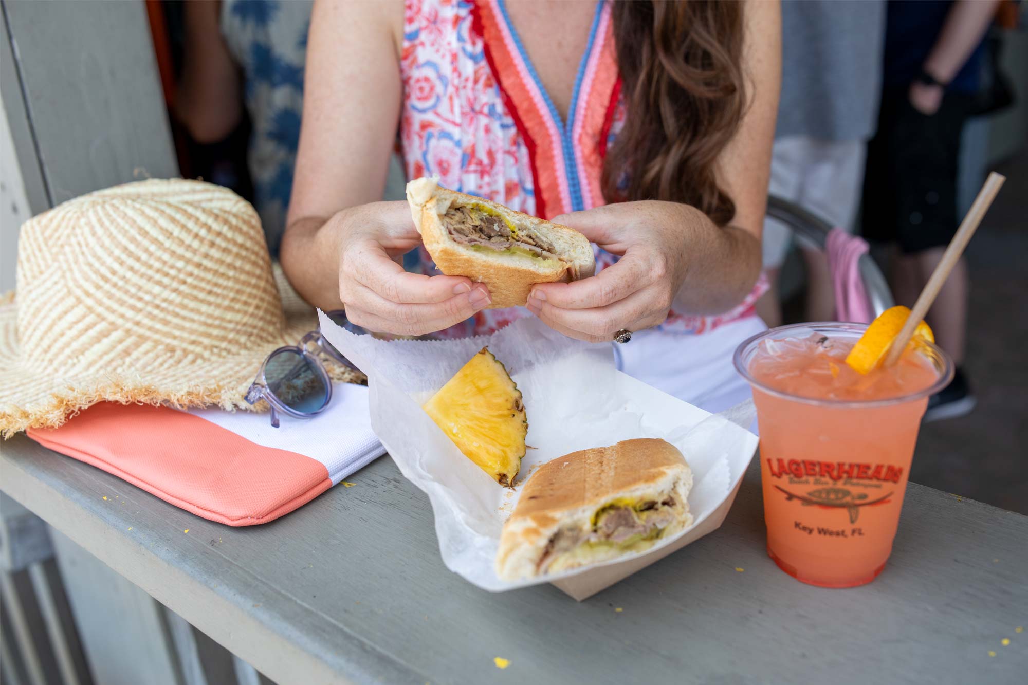 Analise Andrews eating a sandwich
