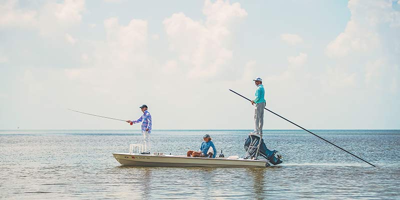 Sandy Moret fishing with friends