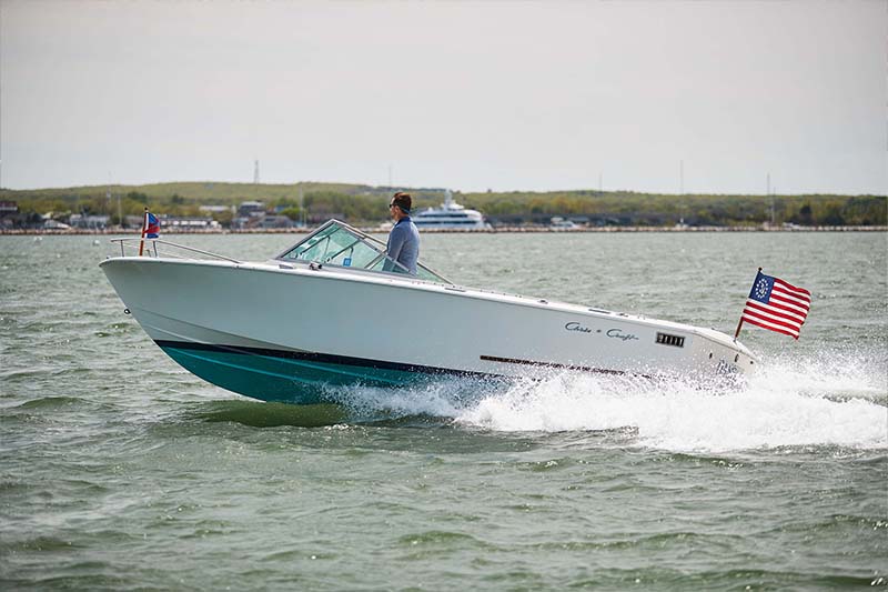 Nick Voulgaris on a boat in the water