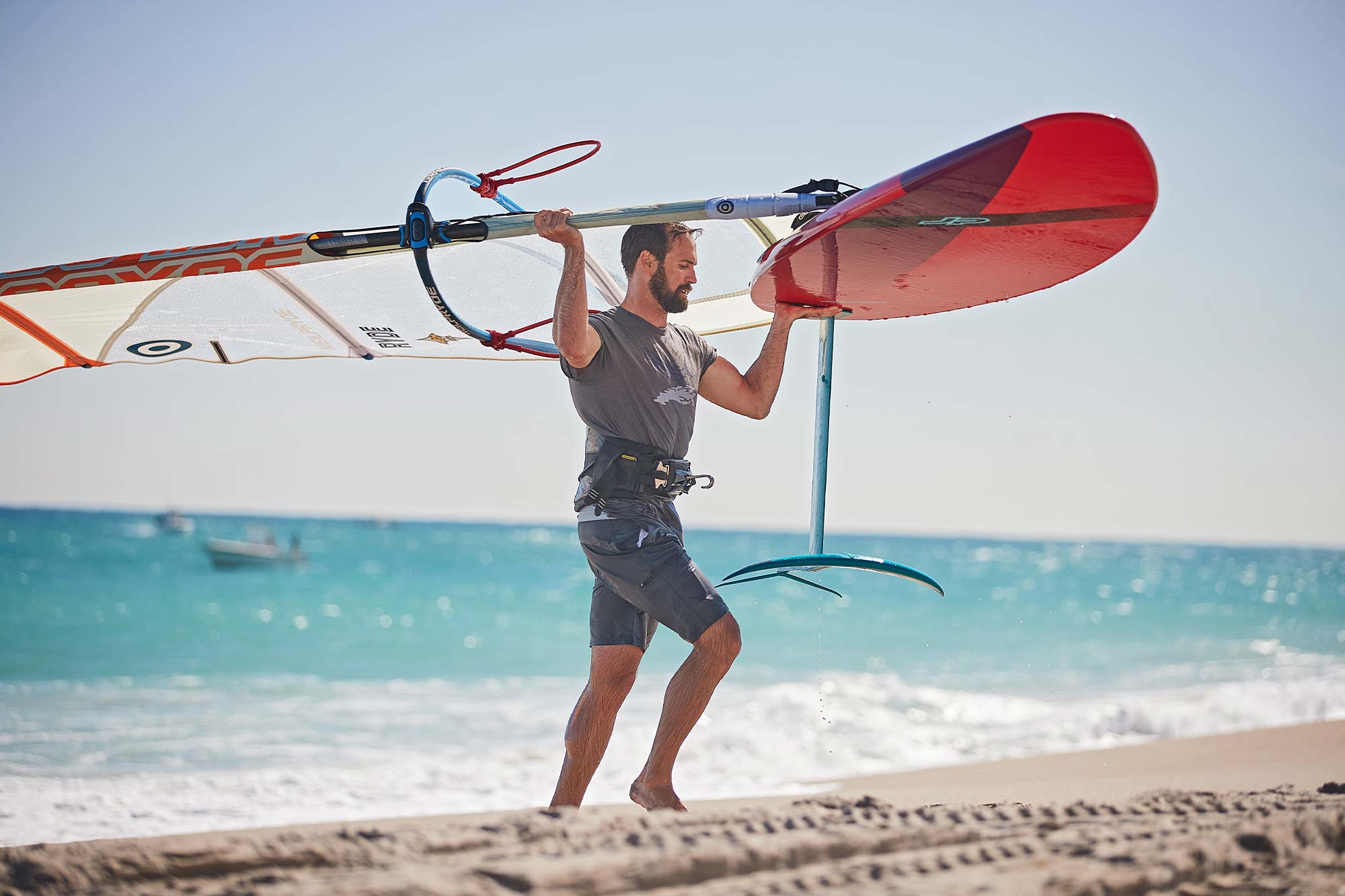 Philip Muller coming in from windsurfing