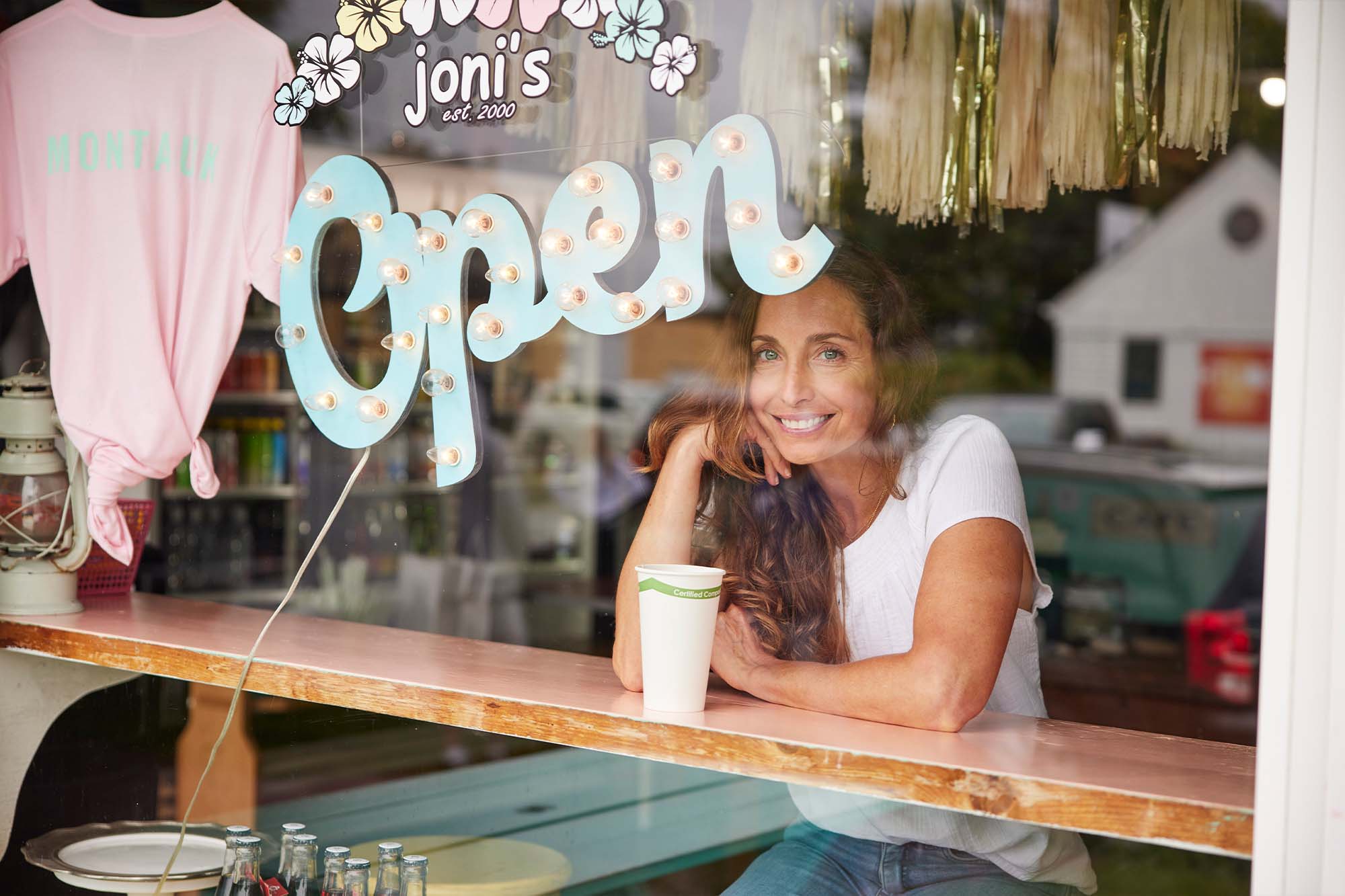 Joni Brosnan in Joni's Kitchen window