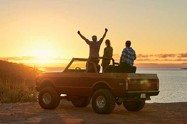 group of people in Chevrolet truck