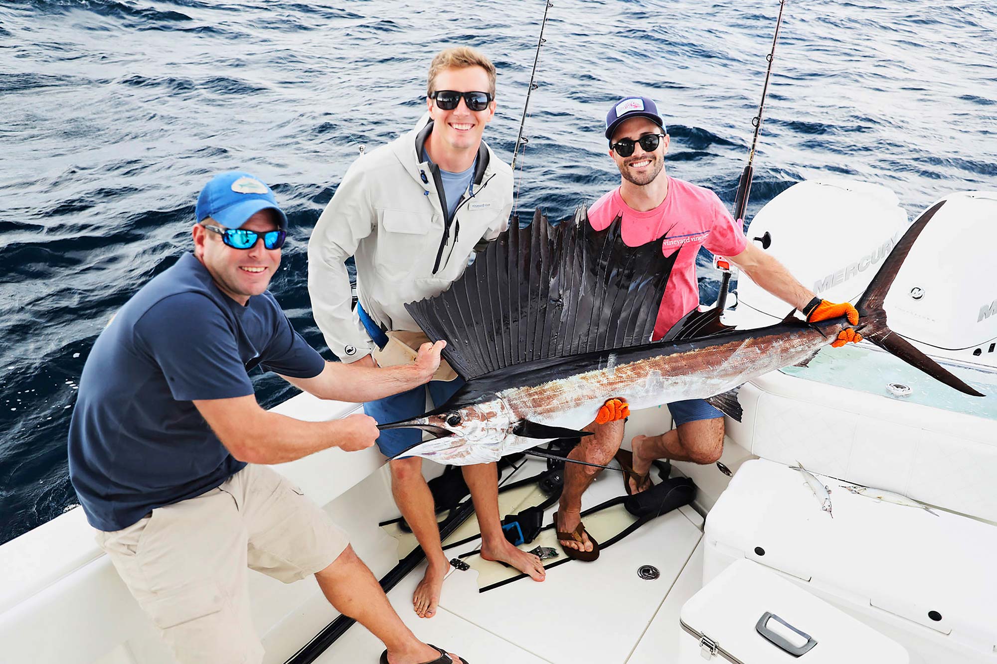Lawson & Jason holding fish