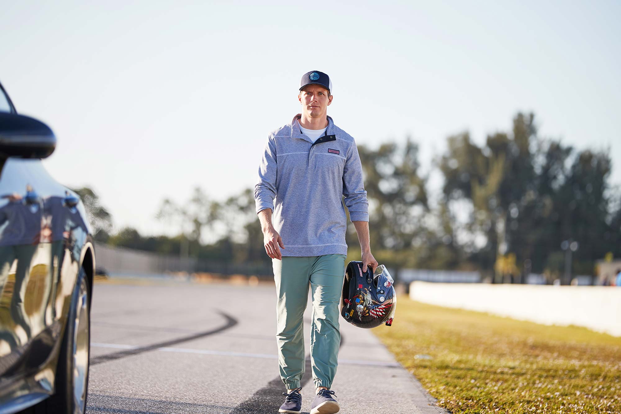 Lawson holding helmet