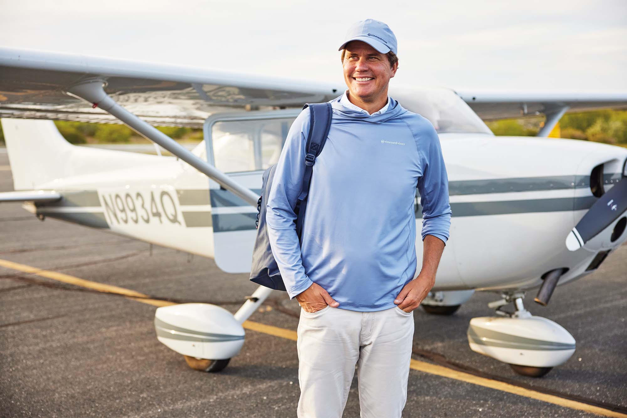 Ryan Chadwick in front of plane